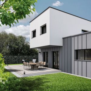 Maison contemporaine à Ustaritz, alliant matériaux naturels et architecture basque moderne.